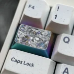 Premium Genshin Impact titanium keycap featuring Raiden Shogun and Yae Miko, showcasing vivid engraved anime art from various angles.