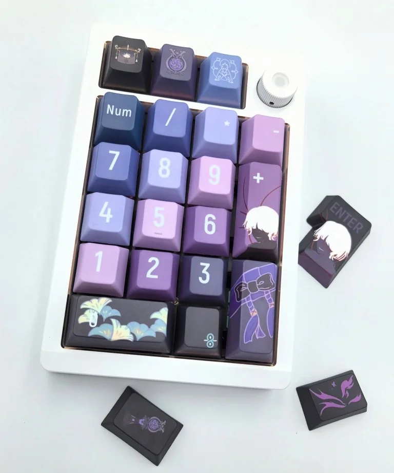 Exclusive Genshin Impact Wanderer PBT Keycaps set, showcasing Scaramouche-inspired designs in mystical blue-purple hues from multiple artistic angles.