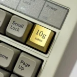 Premium Gold Keycaps gallery revealing its opulent electroplated finish, precise laser-engraved luxury details, and substantial weight from multiple angles.