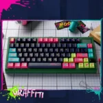 Collection of unique hand-painted graffiti keycaps set, showcasing vibrant street art designs and individual artisan craftsmanship for keyboards.