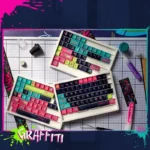 Collection of unique and-painted graffiti keycaps set, showcasing vibrant street art designs and artisan craftsmanship from multiple angles.