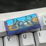 Vibrant Hatsune Miku Titanium Artisan Keycap, a premium 2.25U collectible with striking cyber-pop aesthetics.