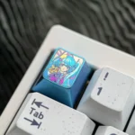 Multiple views of the Exclusive Titanium Hatsune Miku Keycap, showcasing its vibrant anime design, futuristic metallic sheen, and premium design.