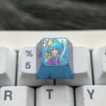 Gallery of the exclusive Hatsune Miku Titanium Keycap, highlighting its vibrant anime design, premium craftsmanship, and collectible ESC appeal.