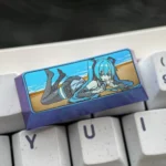 Exclusive Hatsune Miku Titanium Keycap with vibrant, metallic artistry showcasing premium craftsmanship for custom mechanical keyboards.