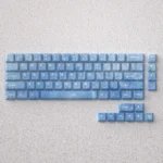Premium Haze Blue PBT keycap set showcasing serene Cherry profile and opaque finish for modern keyboard aesthetics.