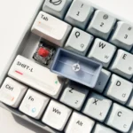 Detailed artistic views of the Luminous Heart Shaped Keycap 1.75u, highlighting its subtle illuminated heart design and sleek dark design.