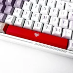 Playful red Translucent Heart Space Key Keycap, a double-shot ABS design with an illuminated heart motif, perfect for personalized keyboards.