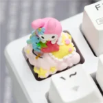 A whimsical handcrafted Hello Kitty: Characters resin keycap for custom mechanical keyboards, featuring the iconic character as a vibrant, charming desktop setup.