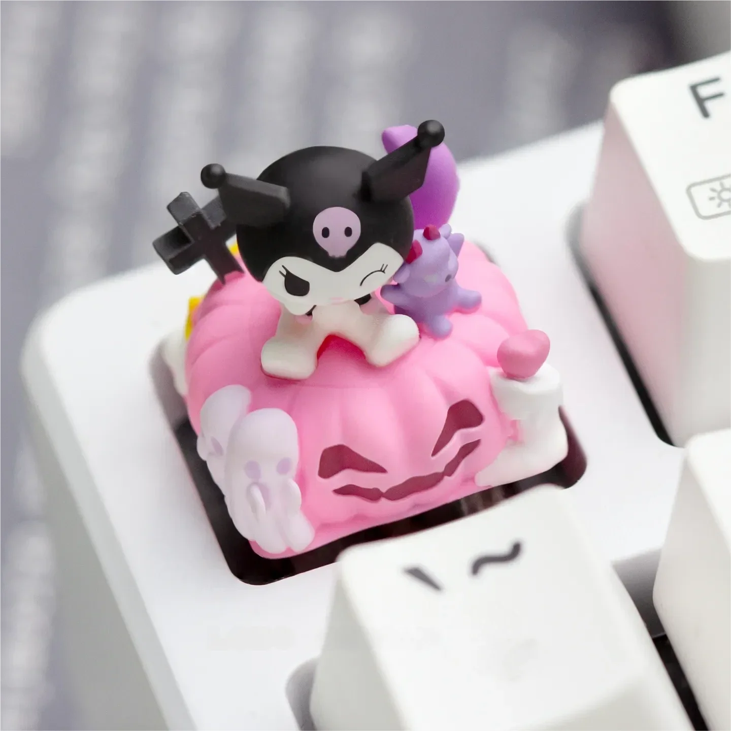 Whimsical handcrafted Hello Kitty: Characters resin keycap for custom mechanical keyboards, featuring vibrant details and a charming miniature design.