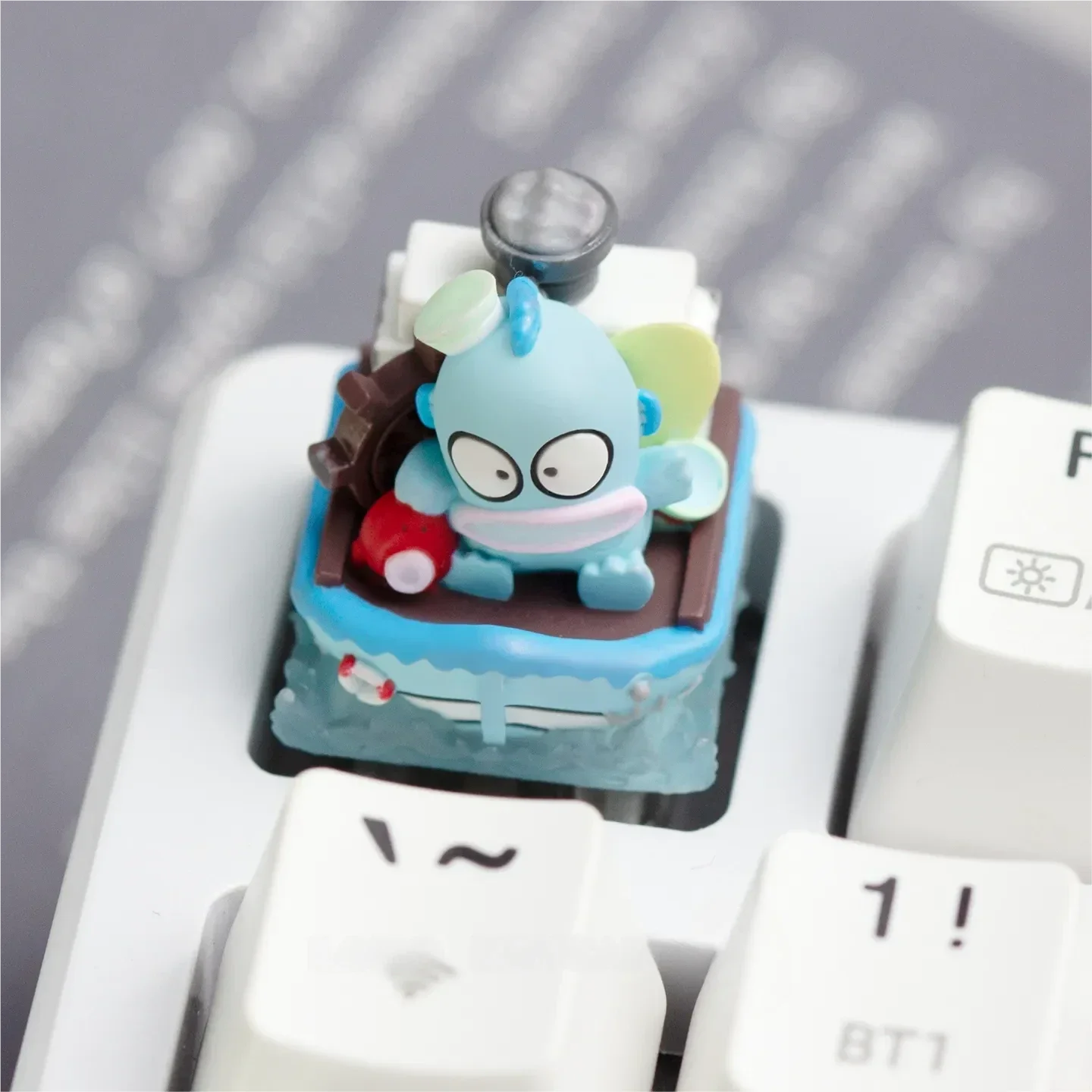 Whimsical handcrafted Hello Kitty: Characters resin keycap for custom mechanical keyboards, featuring vibrant colors and charming detail.