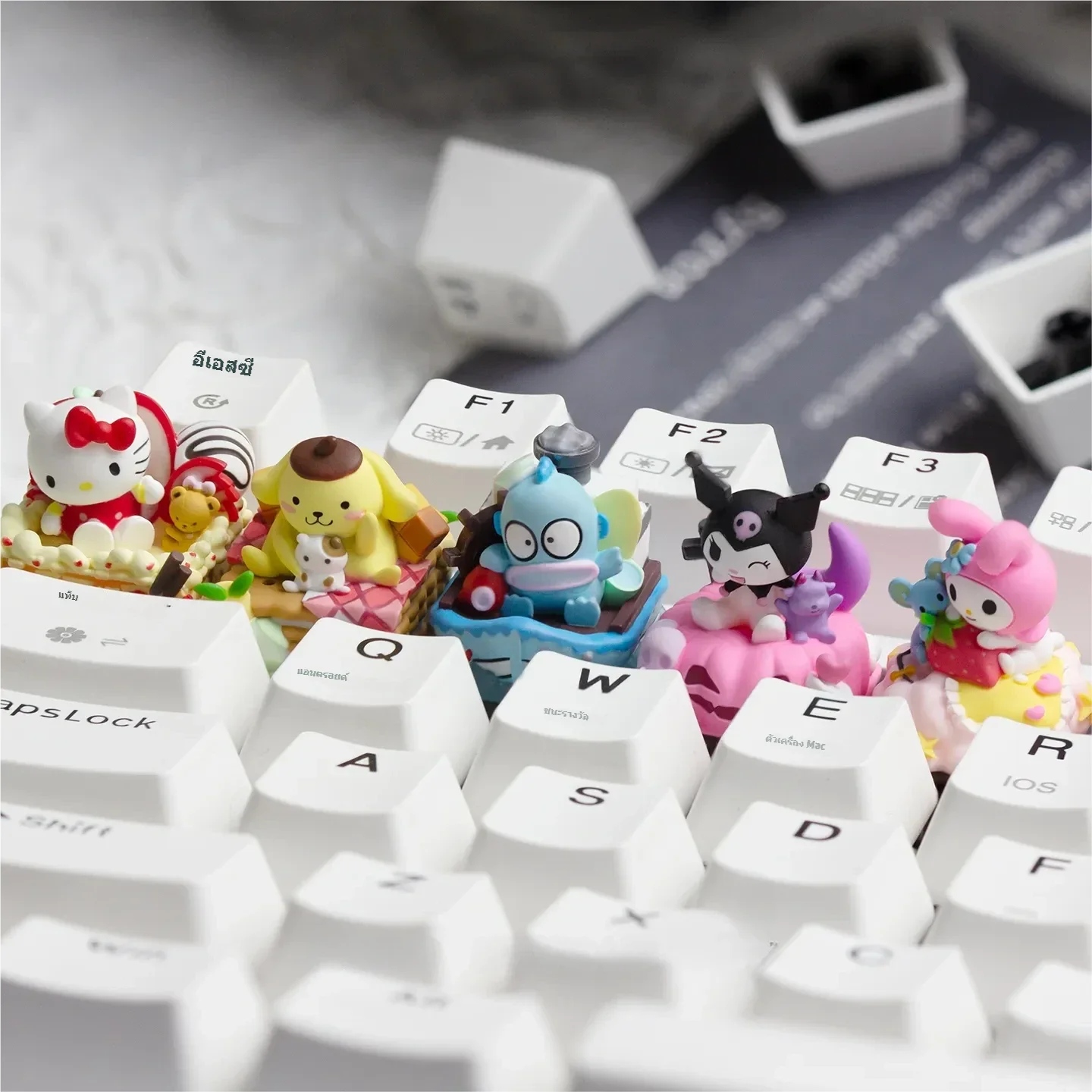Gallery view of the whimsical handcrafted Hello Kitty: Characters resin keycap, showing its vibrant details from multiple charming angles for custom mechanical keyboard.