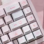 A vibrant gallery of Hello Kitty PBT dye-sub keycaps set, showcasing the playful pink sets iconic characters and durable quality for mechanical keyboard.
