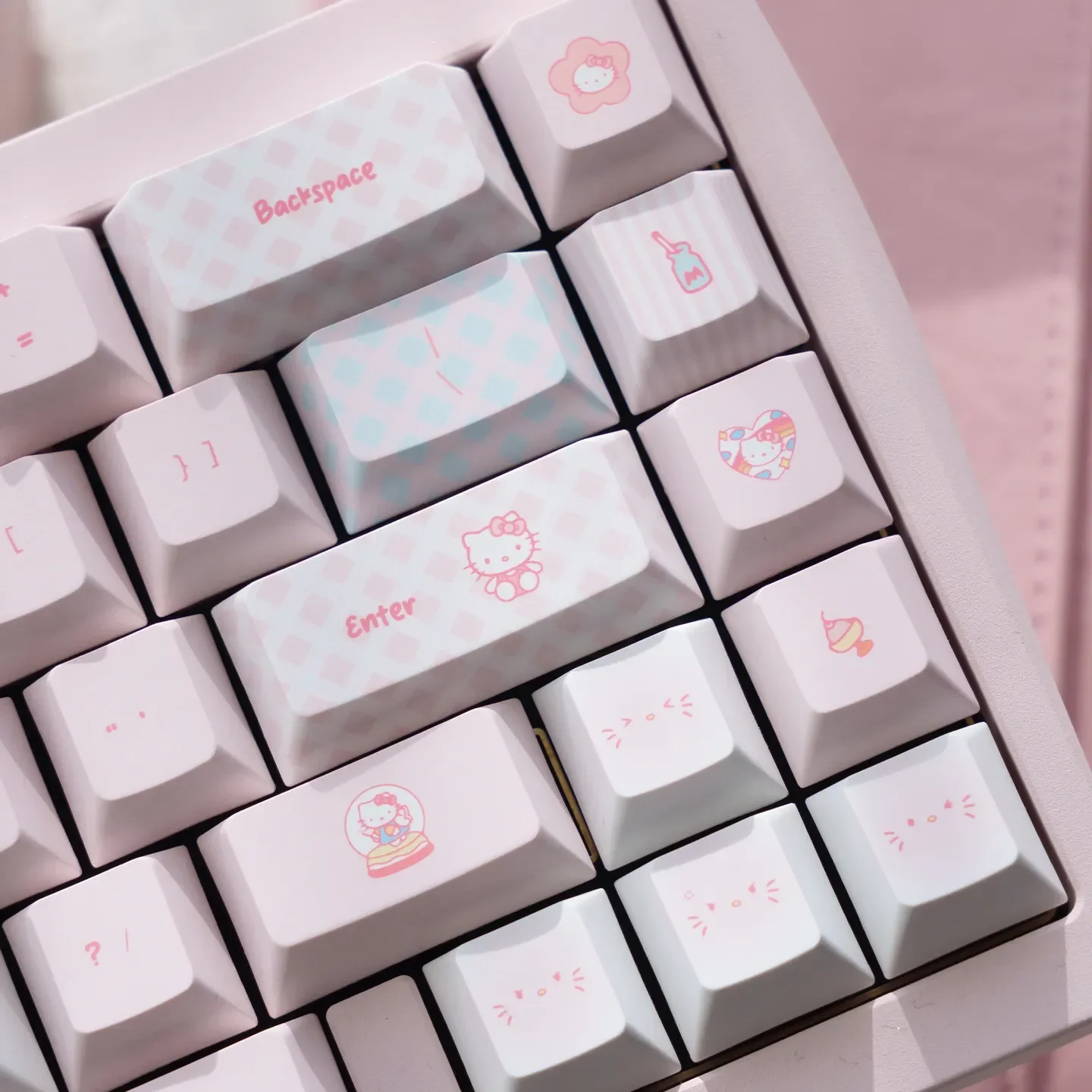 A vibrant gallery of Hello Kitty PBT dye-sub keycaps set, showcasing the playful pink sets iconic characters and durable quality for mechanical keyboard.