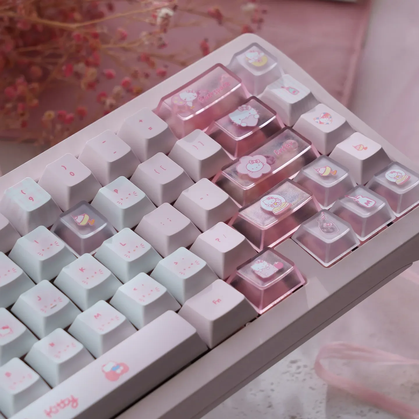 Hello Kitty PBT dye-sub keycaps set. Playful pink Cherry profile Hello Kitty keycaps in a vibrant gallery, showing angles for mechanical keyboards.