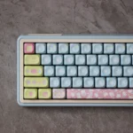 Adorable Hello Kitty MOA profile keycaps set for mechanical keyboards, presented from various angles to highlight the pastel, playful designs.
