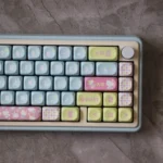 Showcasing the full set of adorable Hello Kitty MOA profile keycaps set, featuring cheerful pastel characters and playful designs perfect for fans.