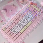 A charming product gallery of Hello Kitty Pink PBT Keycaps Set, showcasing the exclusive sets whimsical design from various angles for playful design.