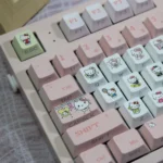 Hello Kitty Joyful Pink PBT keycaps set, an original factory small full set with side translucent legends perfect for vibrant backlighting.