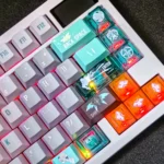 Experience the exclusive Honkai Star Rail Firefly Sam keycap set through detailed images from different angles, revealing its transparent and PBT dye-sub.