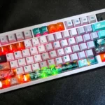 Exclusive Honkai Star Rail Firefly Sam keycaps set from multiple angles, highlighting the ethereal design, transparent keys, and premium PBT dye-sublimated.