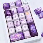 A gallery of Honkai Star Rail Castorice keycaps set, showcasing the elegant butterfly motifs and ethereal aesthetic from various angles.
