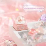 Magical Interactive Snowman Keycaps gallery: see the charming blue snowman ready to jump amidst falling snowflakes with a press, shown from various angles.