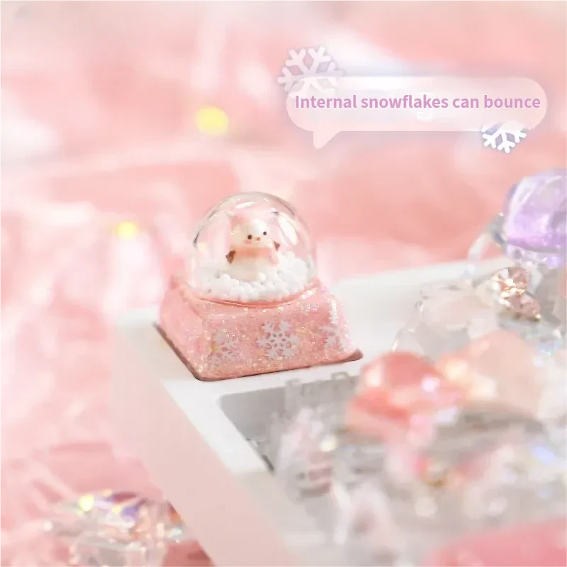 Magical Interactive Snowman Keycaps gallery: see the charming blue snowman ready to jump amidst falling snowflakes with a press, shown from various angles.
