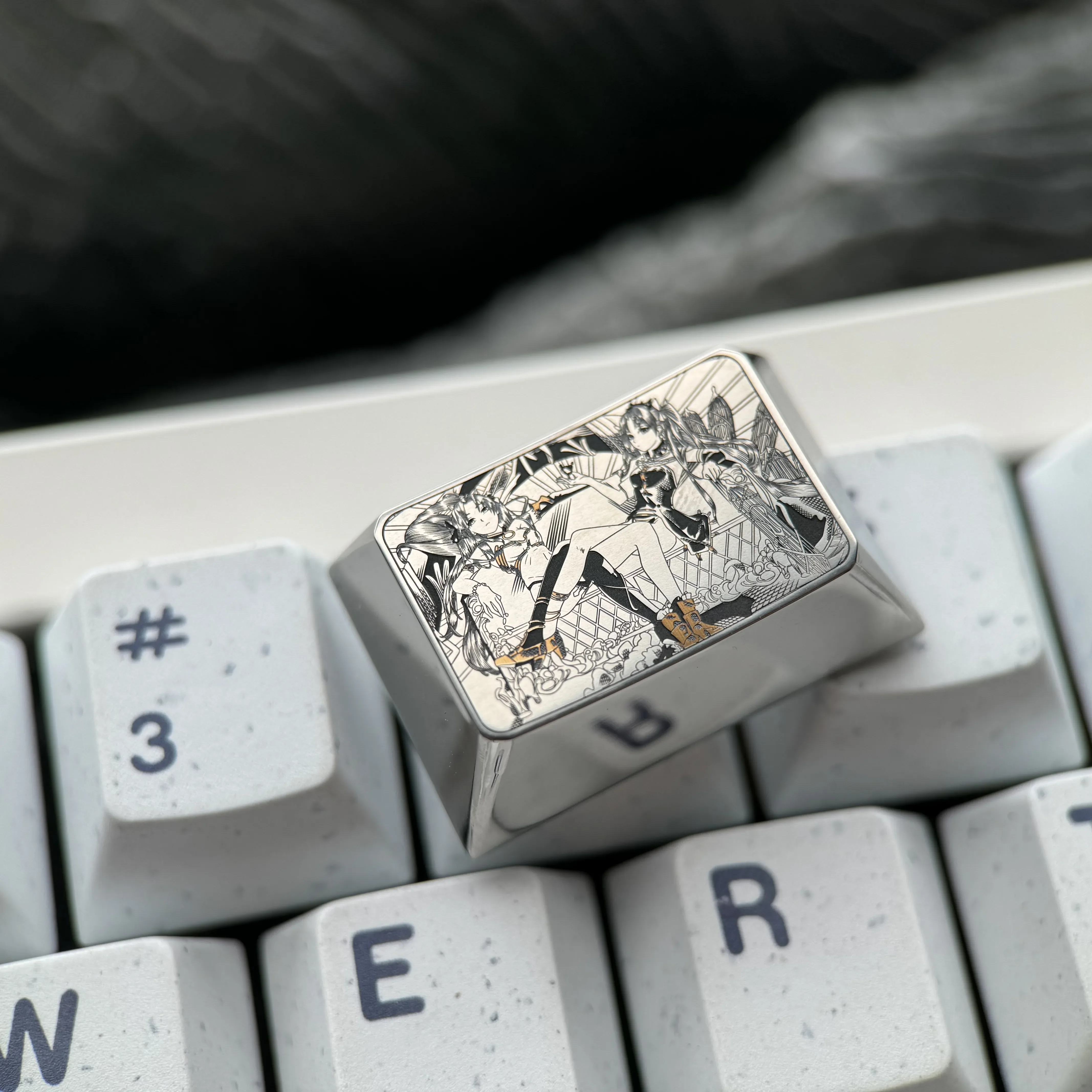 Gallery view of the Premium Ishtar & Ereshkigal Tab Key Keycap, showcasing intricate Fate anime artistry and its polished metallic finish from multiple angles.
