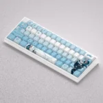 Dynamic Valorant Jett PBT keycaps set displayed from various angles, showcasing vibrant character art and sleek designs for gaming keyboards.