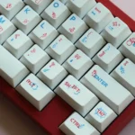 Joyride PBT keycaps set from multiple angles, revealing vibrant, retro-inspired legends and durable design for a playful, adventurous typing journey.