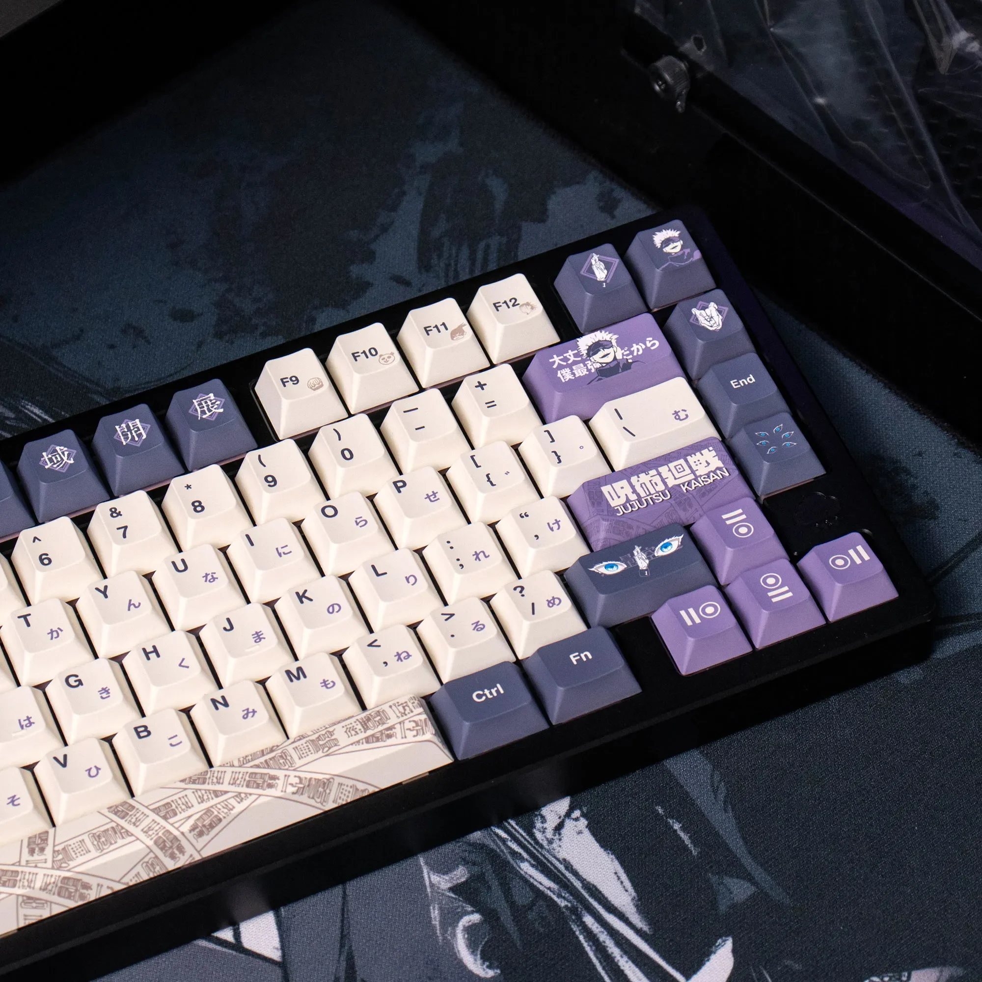 Dynamic Jujutsu Kaisen Gojo Satoru PBT dye-sublimated keycaps set displayed from various angles, highlighting the exclusive, vibrant anime artwork.