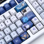 Exclusive Kaeya Genshin Impact artisan keycap set displayed from multiple angles, featuring exquisite icy blue, noble gold, and dark accents.