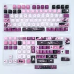 An angled view of the enigmatic Kafka double-shot PBT keycap set, showcasing its sleek purple and black finish and subtle side-printed legends.