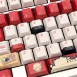 Exclusive Genshin Impact Kaveh Cherry Keycaps set, showcasing intricate Sumeru-inspired artistic designs with signature greens and gold accents from various angles.