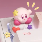 Vibrant, handcrafted 3D Kirby resin artisan keycap for ESC key, showcased from multiple artistic angles.