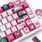 Vibrant red and white Kiriko Overwatch PBT keycaps set, displaying crisp Kitsune spirit and ninja aesthetic. Durable and premium, perfect for gamers.