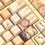 Exclusive Mr Love Kiro PBT dye-sub keycap set shown from a captivating angle, revealing vibrant character art and soft, romantic game motifs.