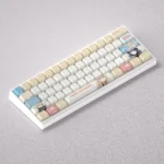 A collection of vibrant Kitagawa Marin keycaps set, displaying various expressive anime character designs crafted from premium PBT.