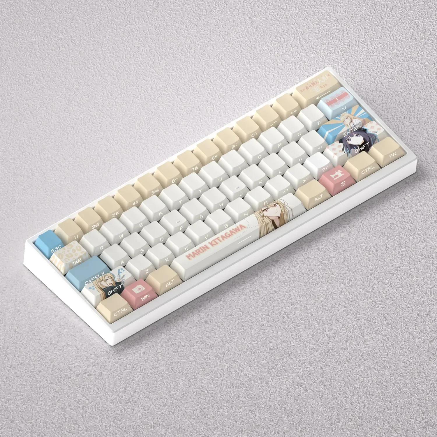 A collection of vibrant Kitagawa Marin keycaps set, displaying various expressive anime character designs crafted from premium PBT.