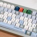 Explore the full artistic charm of the Lazy Fox Keycap Set in this gallery, highlighting the whimsical collage art and premium PBT+PC material.