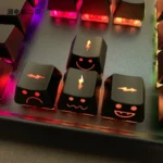 Four vibrant Lightning Cloud Movement Control Keycaps in translucent ABS, showcasing the unique energetic design for an electrifying RGB setup.