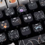 Exclusive Lord Mysteries Klein Moretti keycaps set, showcasing whimsical illustrations and mystical Lord of the Mysteries motifs from multiple artistic angles.