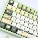 Gallery of the elegant Lu Chen collectible keycap set, showcasing its unique side-engraved details and minimalist artistry from multiple angles.