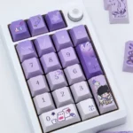 Lucien Keycaps Queen's Choice PBT set, artfully displayed from a new perspective, revealing elegant purple and blue Lucien-themed motifs on durable PBT setup.