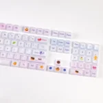 Various angles of whimsical Luminous Macaron Crystal Jelly Gradient Keycaps Set, highlighting their sparkling pastel hues and translucent jelly glow.