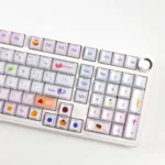 A collection of luminous Macaron crystal jelly gradient keycaps set, showing their whimsical pastel hues and sparkling translucent design.