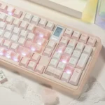 Magical Ethereal frosted translucent keycap set, showcasing its artistic foggy design from multiple angles with diffused light for a unique keyboard aesthetic.