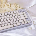 Ethereal shimmering translucent magnetic keycaps set displayed from multiple angles, revealing their jade-like glow and premium PBT+PC material set.