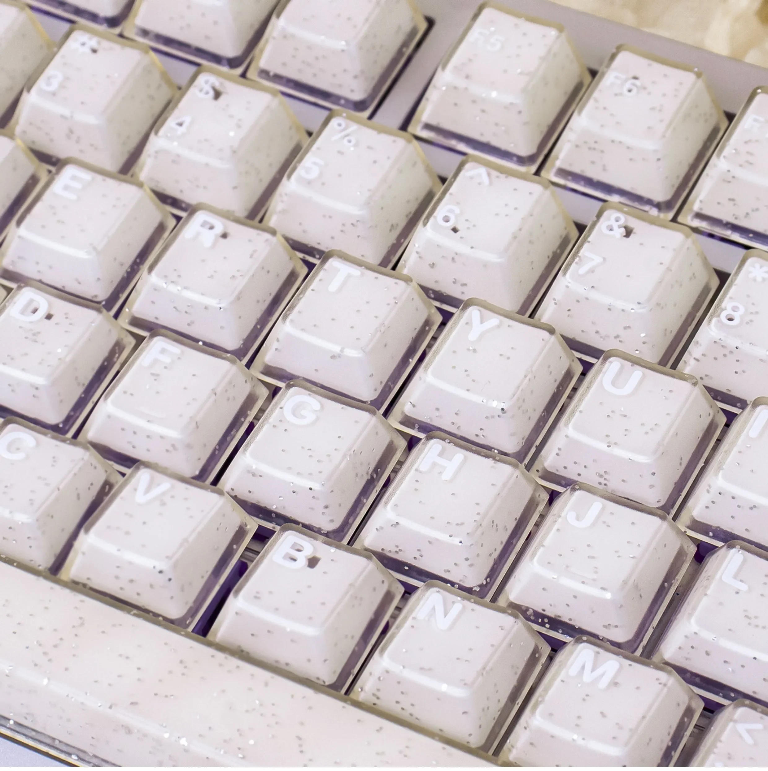 Ethereal shimmering translucent magnetic keycaps set with jade elegance. Captures their premium PBT+PC construction and crystal-inspired glow.